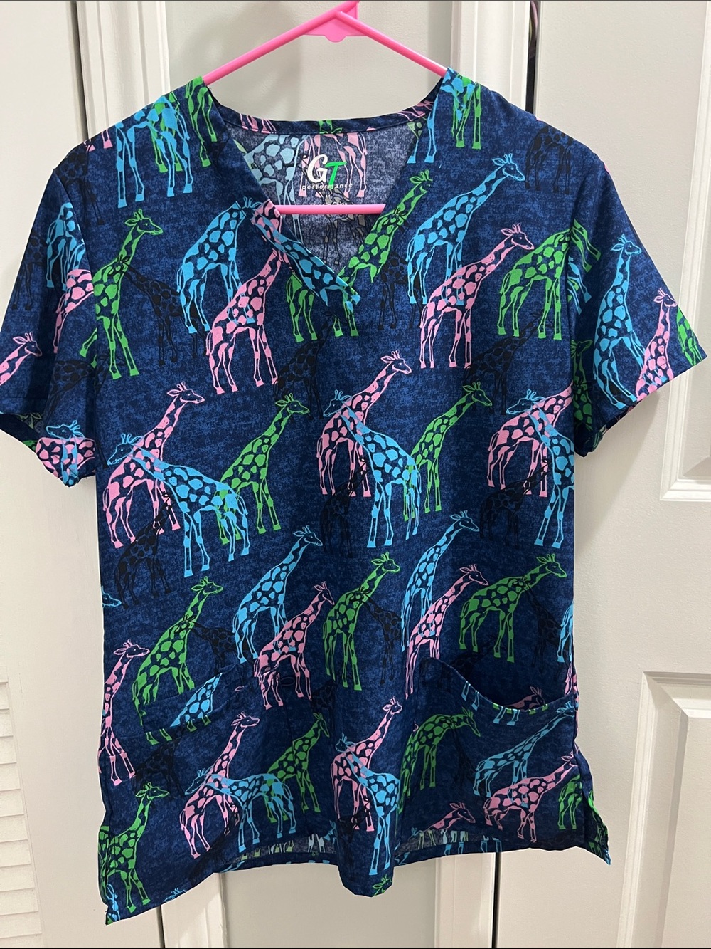 Women’s GT Performance Blue Scrub Top with Colorful Giraffe Print Size M